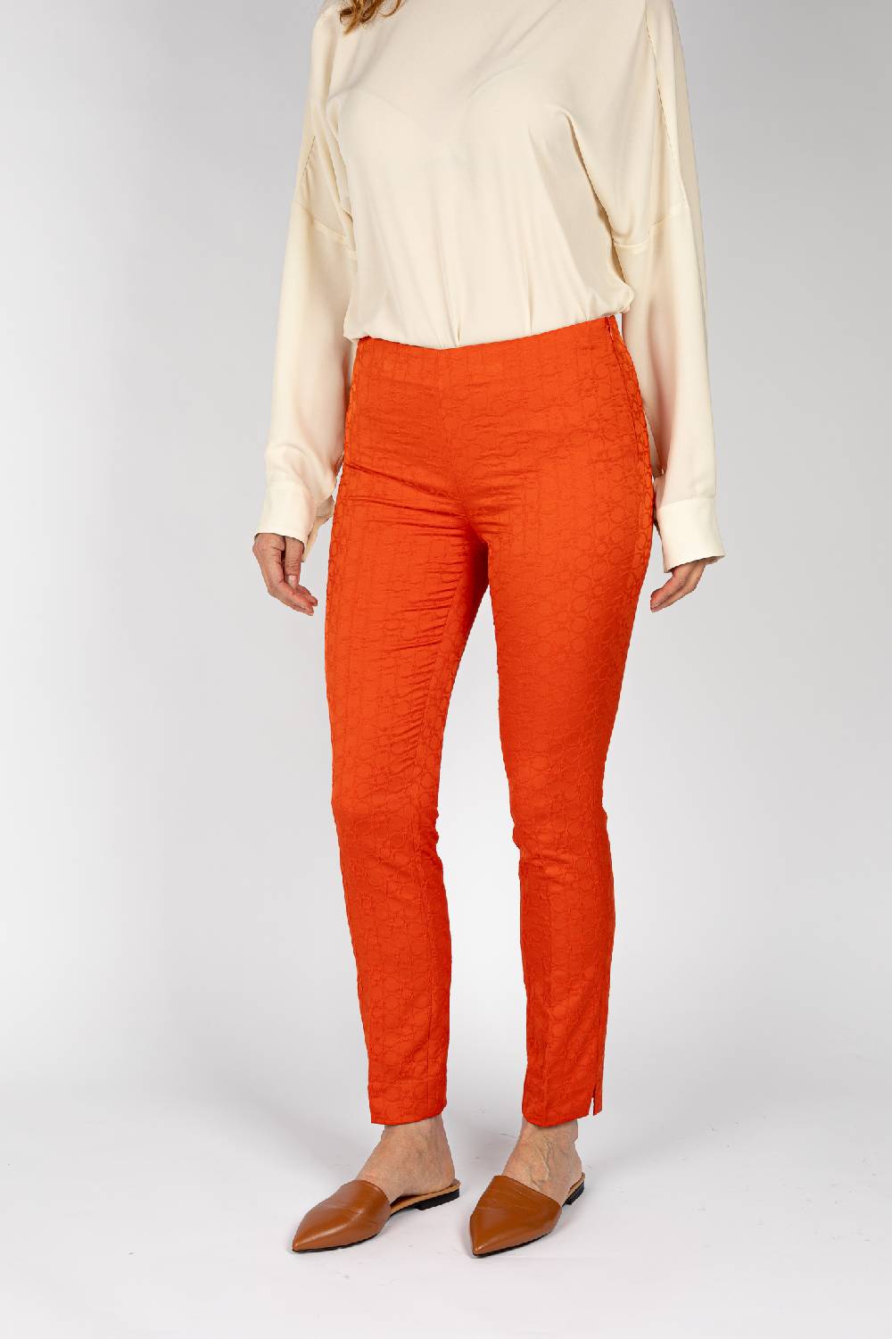 L.Pucci Pantaloni jacquard a fiore colore arancio, linea stretta Vendita