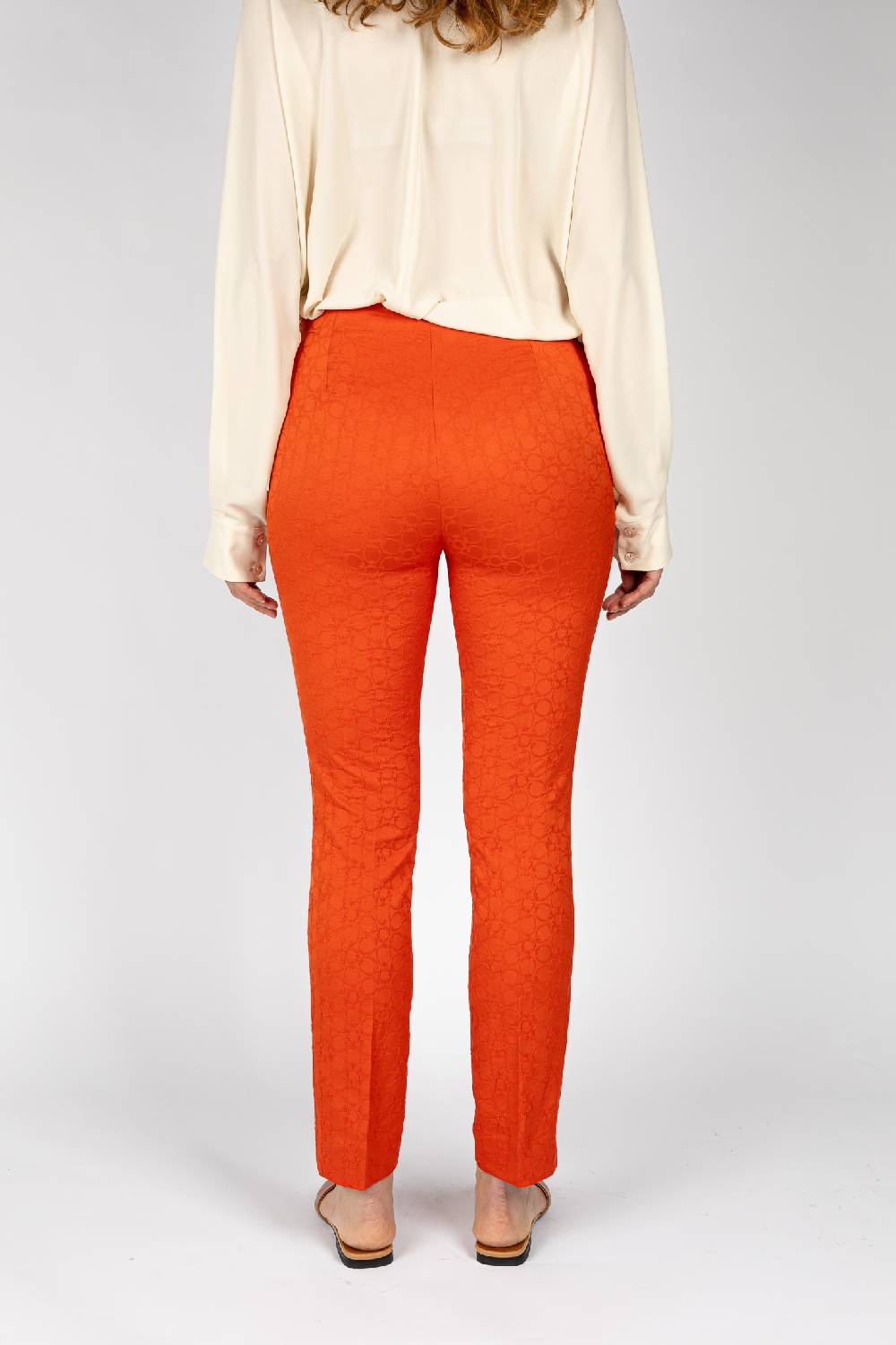 L.Pucci Pantaloni jacquard a fiore colore arancio, linea stretta Vendita