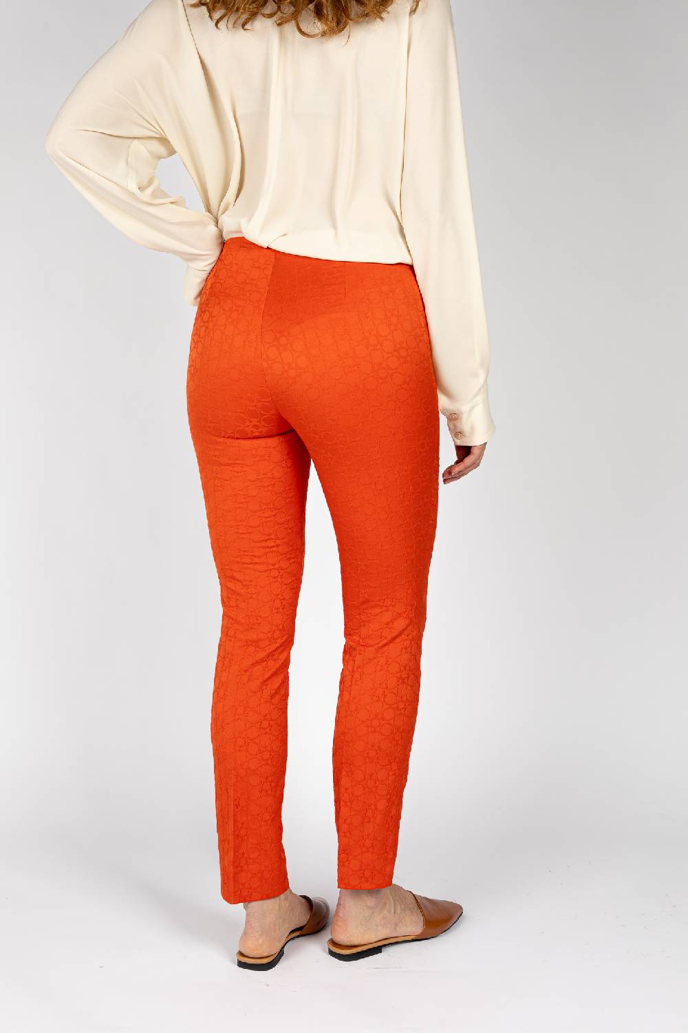 L.Pucci Pantaloni jacquard a fiore colore arancio, linea stretta Vendita