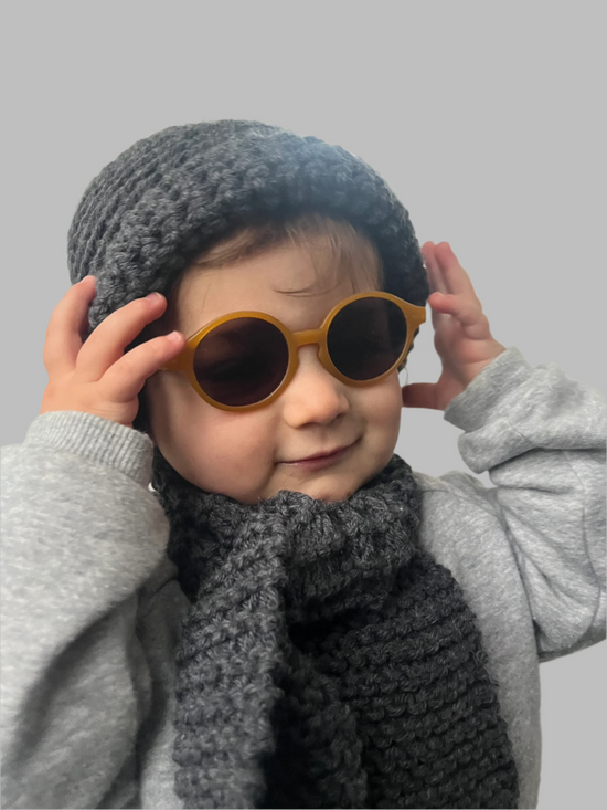 ﻿Zerobarracento Hand-knitted wool scarf for baby Vendita